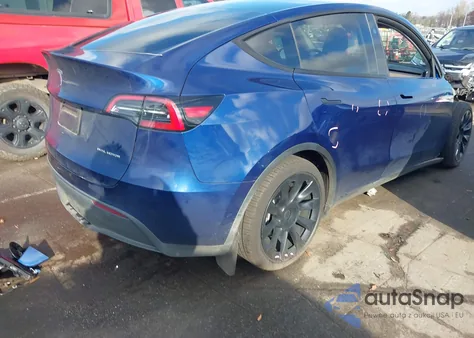 2023 Tesla Model Y Awd/Long Range Dual Motor All-Wheel Drive z USA, uszkodzony, nr VIN 7SAYGDEE1PA142167